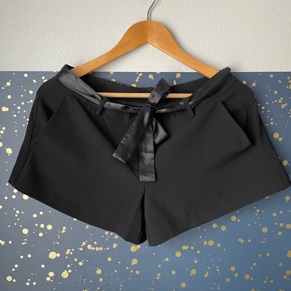 Sisley dressy shorts with satin belt.